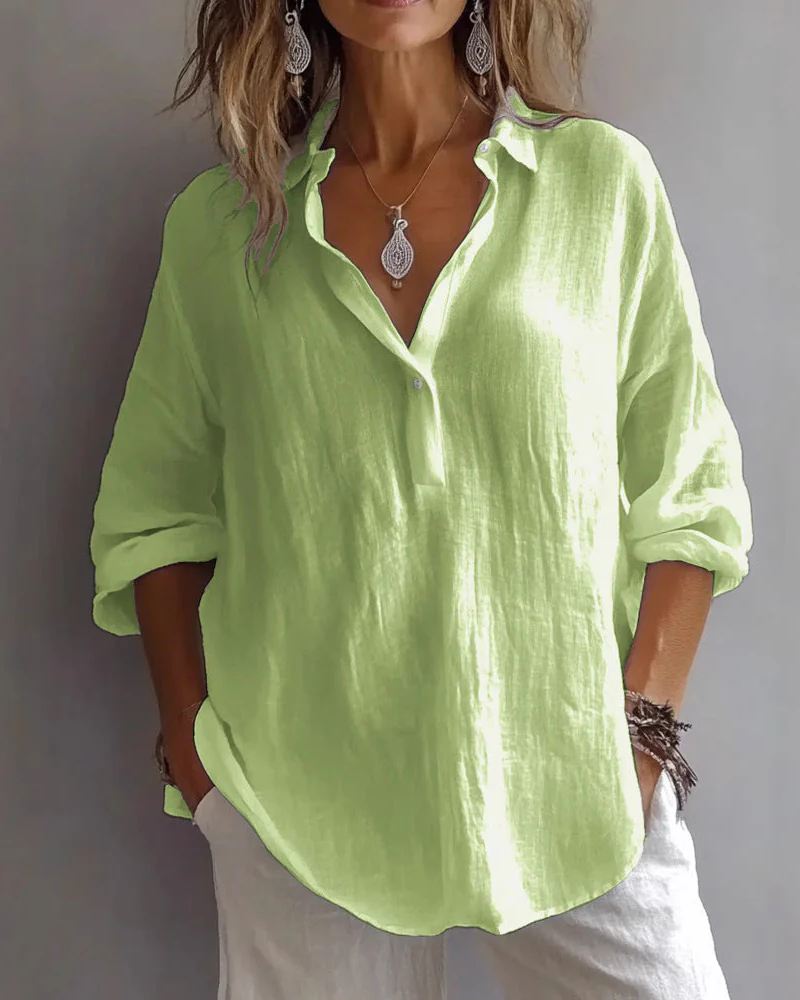 Blusa Suelta con Cuello en V y Mangas Ajustables