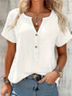 Blusa Elegante con Cuello en V y Botones de Madera