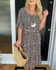 Leticia™ Vestido Midi de Lunares con Cuello Redondo Fluido